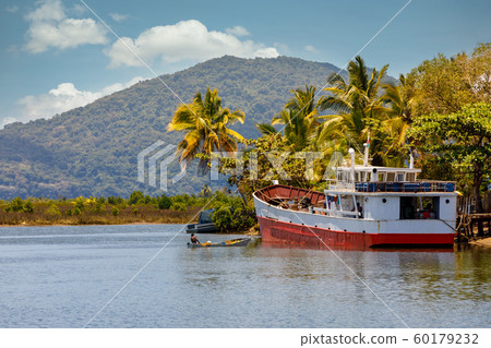 rusted abandoned boat, Maroantsetra, Madagascar 60179232