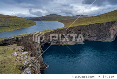 Sorvagsvatn lake over the ocean in Faroe Islands Sorvagsvatn lake over the ocean in Faroe Islands 60179546