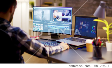 Content creator using modern software for video post production Content creator using modern software for video post production 60179805