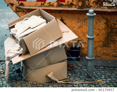 Garbage In Front of A Garbage Container In Berlin, Germany Garbage In Front of A Garbage Container In Berlin, Germany 60179957