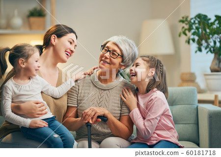 girls, their mother and grandmother 60181718