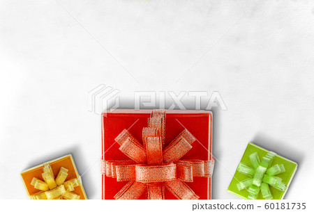 Colorful gift box with a ribbon Colorful gift box with a ribbon 60181735