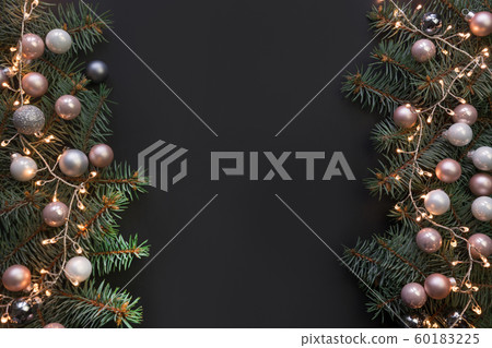 Christmas frame with fir branches, pink balls. 60183225
