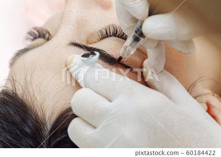 Permanent makeup, tattooing of eyebrows 60184422