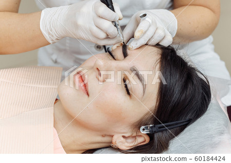 Permanent makeup, tattooing of eyebrows 60184424