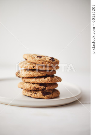 Chocolate chip cookies, Sweet biscuits. Chocolate chip cookies, Sweet biscuits. 60185205