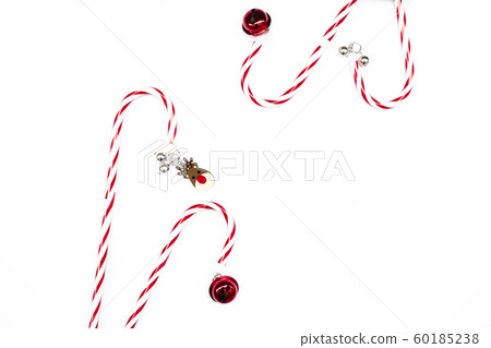 Christmas composition. Border made of red decorations on white background. 60185238