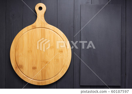 pizza cutting board at rustic wooden plank pizza cutting board at rustic wooden plank 60187597