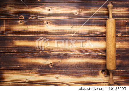 rolling pin at wooden background rolling pin at wooden background 60187605