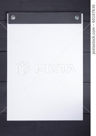 sheet of paper with empty pages on black sheet of paper with empty pages on black 60187636