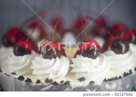Chocolate fondue with Cheery fruit in christmas Chocolate fondue with Cheery fruit in christmas 60187686