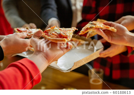 Happy co-workers celebrating while company party and corporate event 60188613