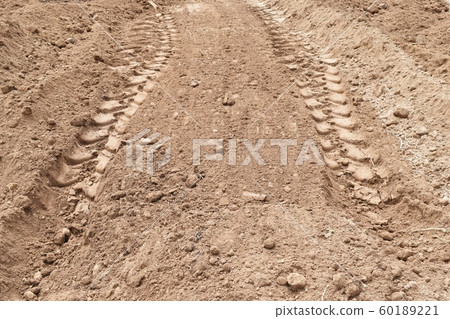 lots tire track on dirty soil ground  60189221