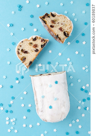 traditional german christmas cake stollen on blue background 60189837