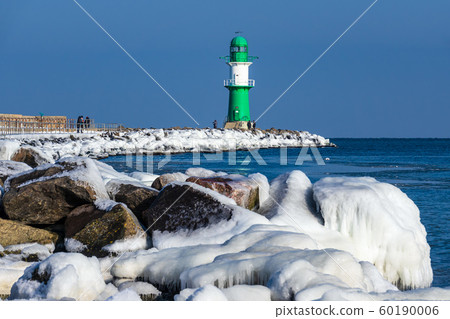 Mole in winter time in Warnemuende, Germany 60190006