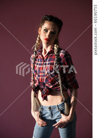 Beautiful fashionable woman with braids portrait of country 60190755