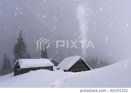Fantastic landscape with snowy house 60191202