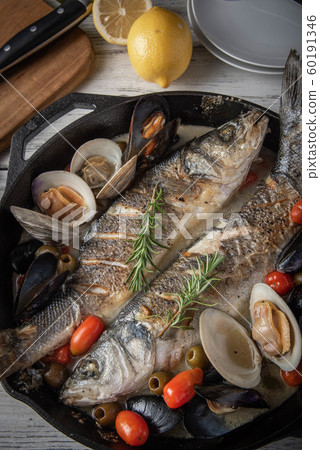 acqua pazza of branzini, european sea bass acqua pazza of branzini, european sea bass 60191346