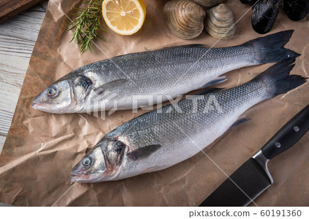 fresh branzini, european sea bass, with clam and fresh branzini, european sea bass, with clam and 60191360
