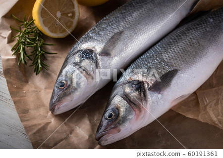 fresh branzini, european sea bass, with clam and fresh branzini, european sea bass, with clam and 60191361