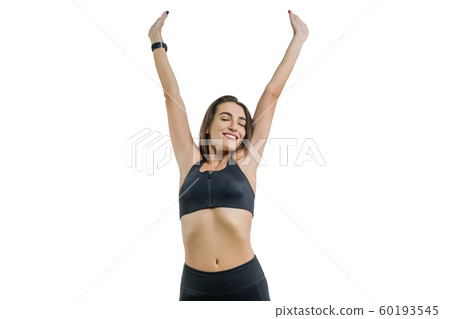 Young woman enjoys sports eyes closed, in black sportswear, isolated on white background Young woman enjoys sports eyes closed, in black sportswear, isolated on white background 60193545