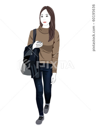 Female college student going to school in sweater and jeans Female college student going to school in sweater and jeans 60195636