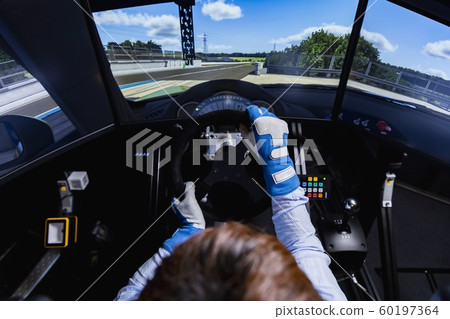 Driving a car with a driving simulator Driving a car with a driving simulator 60197364