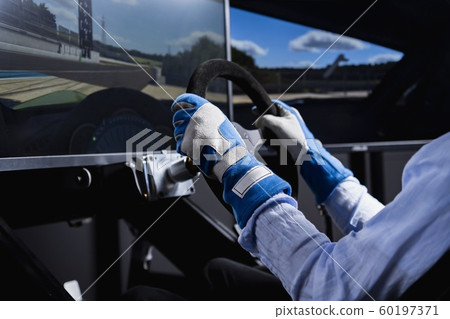 Driving a car with a driving simulator 60197371