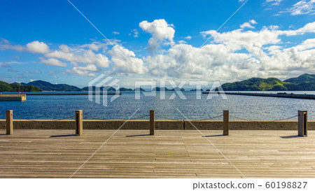 Wood deck overlooking Aomi Island in the Sea of Japan Wood deck overlooking Aomi Island in the Sea of Japan 60198827