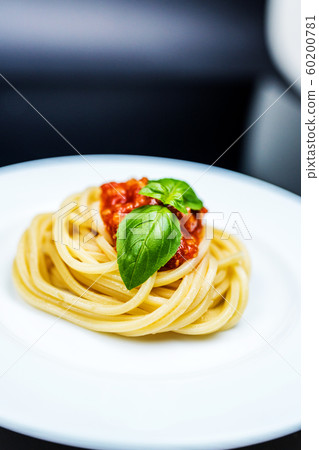 Italian spaghetti on black Italian spaghetti on black 60200781
