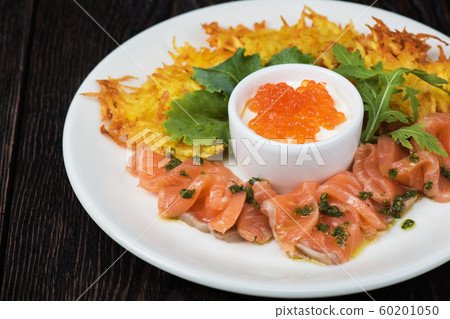 potato pancakes salmon fish and red caviar 60201050