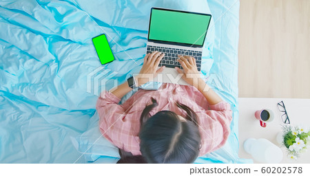 asian woman use laptop 60202578