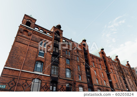 The Warehouse District or Speicherstadt in Hamburg. Wandrahmsfleet canal 60203824
