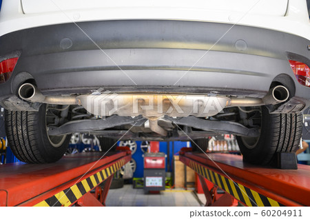 Wheel alignment, car on stand aligning for new tire replacement Wheel alignment, car on stand aligning for new tire replacement 60204911