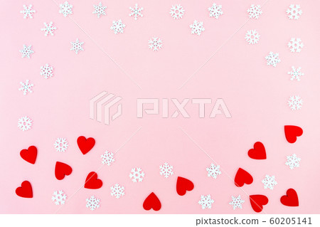 VValentine's Day background. red hearts and snowflakes on pink background. Valentines day concept. VValentine's Day background. red hearts and snowflakes on pink background. Valentines day concept. 60205141