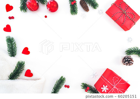 Christmas composition. Christmas gift, fir blanket, pine cones, fir branches on white background Christmas composition. Christmas gift, fir blanket, pine cones, fir branches on white background 60205151
