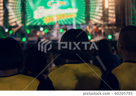 The youth in the concerts have very bright lights The youth in the concerts have very bright lights 60205785