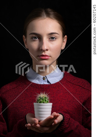 Girl With A Small Cactus Girl With A Small Cactus 60207145