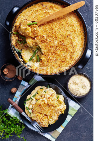cheesy Potato and green bean casserole, top view cheesy Potato and green bean casserole, top view 60207968