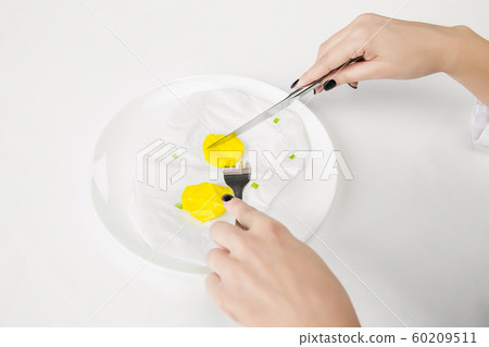 We are what we eat. Woman's eating plastic food, eco concept We are what we eat. Woman's eating plastic food, eco concept 60209511