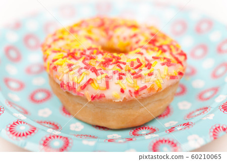 Donut or Doughnut With Colorful Frosting and Sprinkles Donut or Doughnut With Colorful Frosting and Sprinkles 60210065