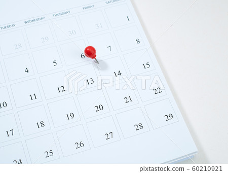Calendar and red pushpin on 14 February Calendar and red pushpin on 14 February 60210921