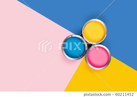 Three-colored background with paint jars. 60211452