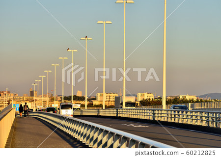 Blue sky and white Shonan Bridge and couple 60212825