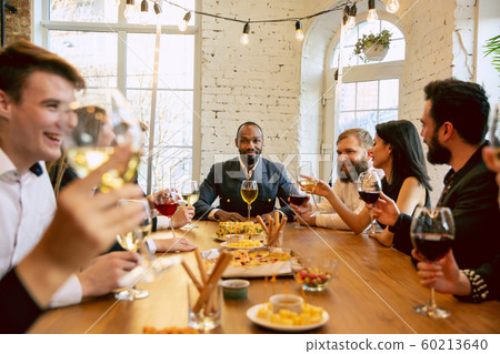 Happy co-workers celebrating while company party and corporate event 60213640