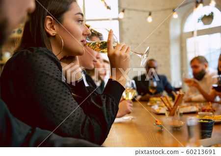 Happy co-workers celebrating while company party and corporate event 60213691
