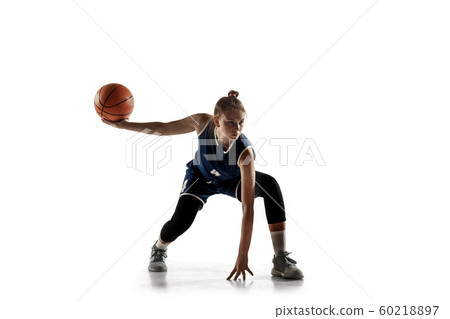 Young caucasian female basketball player against white studio background Young caucasian female basketball player against white studio background 60218897