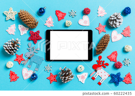 Top view of digital tablet surrounded with New 60222435