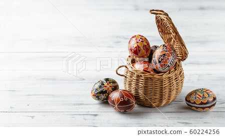 Easter eggs decorated with wax resist technique 60224256