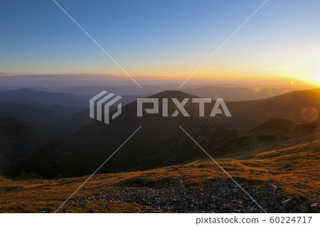 Majestic sunrise in the mountains landscape. Majestic sunrise in the mountains landscape. 60224717